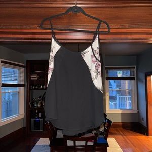 Silky black tank with flower detailing, great condition.